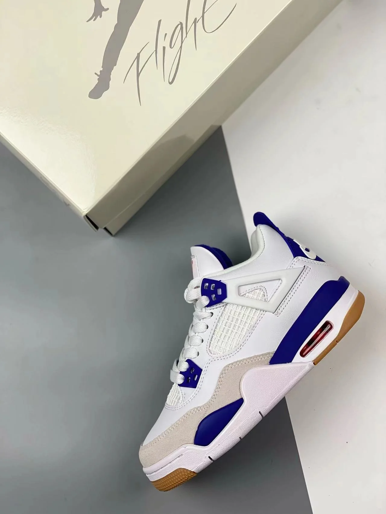 AJ4 SB Summit White/Navy - Image 7